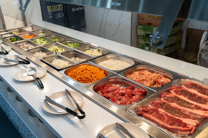 Raw Meats and Vegetables at the Grill Station